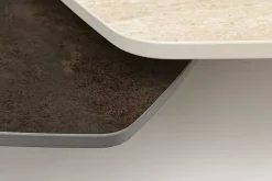 Design Couchtisch MOVEMENT rost Pentagon drehbar Travertin Keramik schwarz Metall