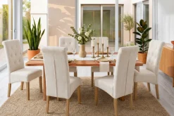 Design Stuhl CASA beige Strukturstoff Massivholzbeine mit Zierknöpfen und Nackenrolle