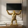 Handgefertigte Tischlampe KING APE 70cm schwarz gold Stoffschirm Affen-Skulptur