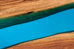 Massiver Esstisch LIQUID 160cm braun Akazienholz Baumkante schwarz Eisen blau